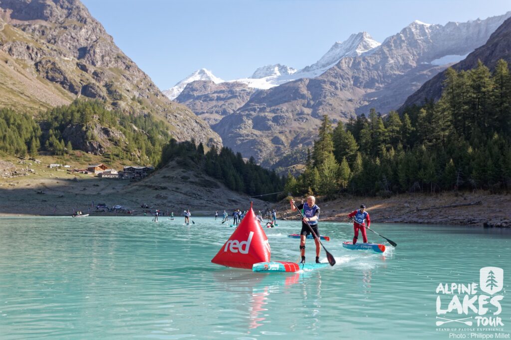 sup on a lake in the italian alps